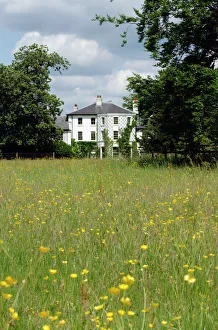 <b class=qtipBold><figcaption>Down House K030551</figcaption></b><br>DOWN HOUSE, Downe, Kent. The house from across the Great Meadow.<br><em>© Historic England</em> Down House K030551