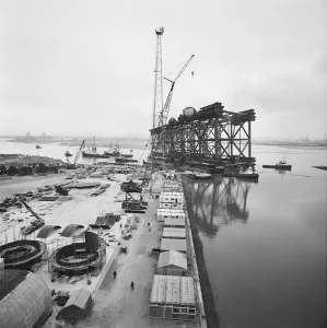 Prints of Graythorp, Hartlepool. A view of tug boats towing the oil platform Graythorp I away from the dry dock basin at Graythorp Industry and Agriculture in England - Factories, Farming and Production: Oil Rig Leaving Dry Dock Print, Graythorp I