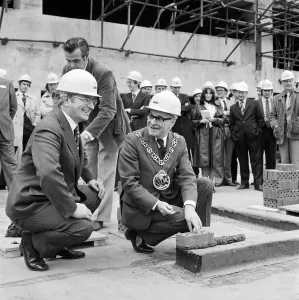 Prints of WOOD GREEN SHOPPING CITY, HARINGEY, GREATER LONDON. The Mayor of Haringey, Councillor Vic Garwood, laying a brick to mark the start of housing construction at Wood Green Shopping City Engineering And Construction Prints: Ceremonial Brick Laying Print, Wood Green Shopping City