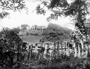 <b class=qtipBold><figcaption>Kiftsgate Court CC72_01999</figcaption></b><br>KIFTSGATE COURT, Chipping Camden, Gloucestershire. A distant view of the house from the road. The origins of the house are late 18th century - it was built for Walwyn Graves (born 1744, died 1813) with the remainder of house built in a 17th century style between 1887-91. Photographed by Henry Taunt (active 1860 - 1922).<br><em>© Historic England</em> Kiftsgate Court CC72_01999