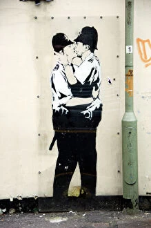 Street art graffiti Collection: Kissing Coppers DP054452