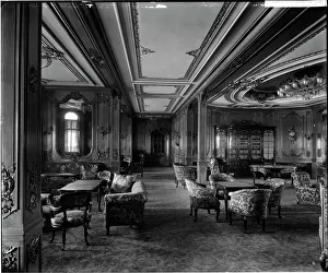 <b class=qtipBold><figcaption>Lounge, RMS Olympic BL24990_006</figcaption></b><br>The lounge, RMS Olympic, White Star Line, 1920-21. The Olympic was sister ship to the ill-fated Titanic and Britannic. This Bedford Lemere and Company photograph was commissioned by the White Star Line, which was also known as the Oceanic Steam Navigation Company, and was probably taken at Southampton docks.<br><em>© Historic England Archive</em> Lounge, RMS Olympic BL24990_006