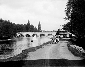 <b class=qtipBold><figcaption>Maidenhead Bridge CC97_02744</figcaption></b><br>MAIDENHEAD BRIDGE, Maidenhead, Berkshire. The north aspect of the bridge seen from the Buckinghamshire bank, with a small party of girls walking along the riverside path. The graceful bridge is built from Portland stone and was constructed in the 1770s, opening for traffic in 1777. Photographed in 1885 by Henry Taunt.<br><em>© Historic England</em> Maidenhead Bridge CC97_02744
