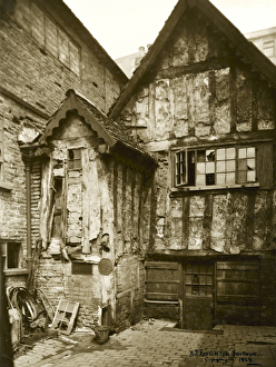 <b class=qtipBold><figcaption>Medieval Nottingham OP06315</figcaption></b><br>Marsh Farm House, Red Lion Street, Nottingham. A timber-framed house photographed in 1925 by Alfred John Loughton. Red Lion Street was the new name given to Narrow Marsh (the medieval north-south throughfare) in 1905. The area underwent slum clearances in the 1920s and is now Cliff Road.<br><em>© Historic England Archive</em> Medieval Nottingham OP06315