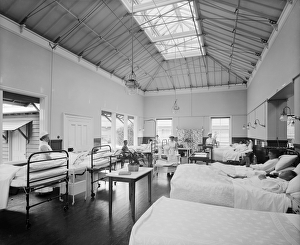 <b class=qtipBold><figcaption>Military hospital BL23135</figcaption></b><br>WOBURN ABBEY, Bedfordshire. Open-air ward in the military hospital showing nurses and injured soldiers on the ward. Open-air treatment was used to treat infections and wounds in the early 20th century. Dame Mary Russell, Duchess of Bedford, converted part of Woburn Abbey into a military hospital during the First World War. Photographed by Bedford Lemere and Co in July 1915.<br><em>© Historic England</em> Military hospital BL23135