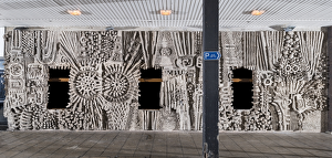 <b class=qtipBold><figcaption>Mitchell - Relief mural DP164662</figcaption></b><br>William Mitchell Sculpture, Bull Yard, Coventry, West Midlands. Exterior, viewed from the south east. (Grade II, An abstract two-facetted relief mural, of 1966 by William Mitchell).<br><em>© Historic England</em> Mitchell - Relief mural DP164662