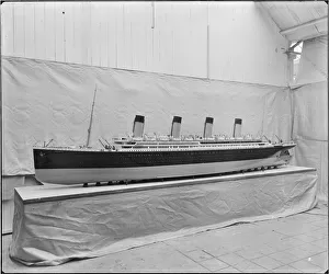<b class=qtipBold><figcaption>Model of RMS Olympic BL26950_002</figcaption></b><br>A model of RMS Olympic. Olympic was one of White Star Line's Olympic-class ocean liners, and sister ship to the Titanic and Britannic. Her maiden voyage from Southampton to New York was in 1911, and she served until 1935. Bedford Lemere and Company were commissioned to take this photograph by White Star Line in 1924.<br><em>© Historic England Archive</em> Model of RMS Olympic BL26950_002
