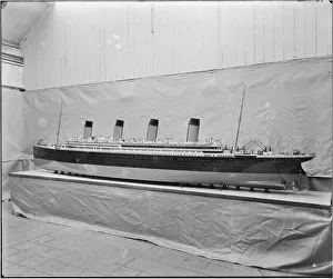 <b class=qtipBold><figcaption>Model of RMS Olympic BL26950_003</figcaption></b><br>A model of RMS Olympic. Olympic was one of White Star Line's Olympic-class ocean liners, and sister ship to the Titanic and Britannic. Her maiden voyage from Southampton to New York was in 1911, and she served until 1935. Bedford Lemere and Company were commissioned to take this photograph by White Star Line in 1924.<br><em>© Historic England Archive</em> Model of RMS Olympic BL26950_003