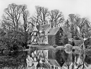 <b class=qtipBold><figcaption>Mongewell Rectory CC97_02328</figcaption></b><br>MONGEWELL, Crowmarsh, Oxfordshire. Looking toward the Rectory from the lake, with numerous chimneys and an ivy-covered wing. Photographed in 1900 by Henry Taunt.<br><em>© Historic England</em> Mongewell Rectory CC97_02328