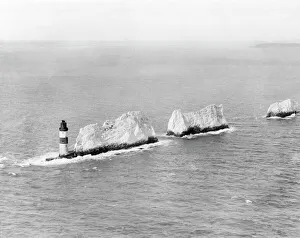<b class=qtipBold><figcaption>The Needles EPW000793</figcaption></b><br>THE NEEDLES, Isle of Wight. Early aerial view of this famous landmark of chalk stacks rising out of the sea, culminating in the Needles Lighthouse (1859). Photographed in April 1920. Aerofilms Collection (see Links). EPW000793<br><em>© Historic England</em> The Needles EPW000793