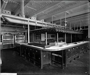 <b class=qtipBold><figcaption>The pantry, RMS Olympic BL24990_038</figcaption></b><br>The pantry, RMS Olympic, White Star Line, 1920-21. The Olympic was sister ship to the ill-fated Titanic and Britannic. This Bedford Lemere and Company photograph was commissioned by the White Star Line, which was also known as the Oceanic Steam Navigation Company, and was probably taken at Southampton docks.<br><em>© Historic England Archive</em> The pantry, RMS Olympic BL24990_038
