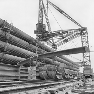 <b class=qtipBold><figcaption>Preston Bus Station JLP01_08_081441</figcaption></b><br>Preston Bus Station, Tithebarrn Street, Preston. The placement of a concrete beam during construction. Photographed in June 1969; John Laing Collection.<br><em>© Historic England Archive</em> Preston Bus Station JLP01_08_081441