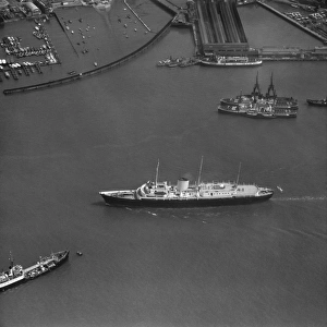 <b class=qtipBold><figcaption>Royal Yacht Britannia EAW075124</figcaption></b><br>The Royal Yacht Britannia in Portsmouth Harbour. May 1959. Aerofilms Collection.<br><em>© Historic England</em> Royal Yacht Britannia EAW075124