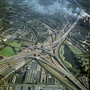 <b class=qtipBold><figcaption>Spaghetti Junction EAW220279</figcaption></b><br>Gravelly Hills Interchange, Birmingham. Junction 6 on the M6 motorway meets the A38 and A5127 in a complex known as "Spaghetti Junction". Photographed by Aerofilms in 1971, before being fully opened the following year.<br><em>© Historic England Archive</em> Spaghetti Junction EAW220279