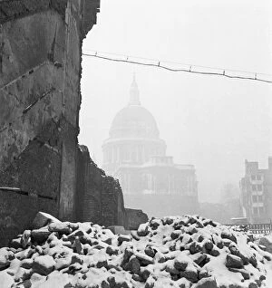 The London Blitz Collection: St Pauls Cathedral in bomb damaged surroundings a093716