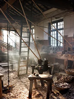 <b class=qtipBold><figcaption>Stott Park Bobbin Mill N080122</figcaption></b><br>STOTT PARK BOBBIN MILL, Cumbria. Interior view, ground floor. Bobbin mill machinery.<br><em>© Historic England</em> Stott Park Bobbin Mill N080122