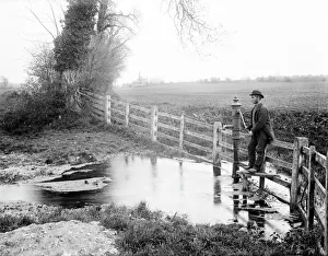 <b class=qtipBold><figcaption>Thames Head CC73_00534</figcaption></b><br>THAMES HEAD, Coates, Gloucestershire. View at the source of the River Thames in the Cotswolds at Thames Head. Showing the fourth spring and man beside the pump. Photographed by Henry Taunt in 1890.<br><em>© Historic England</em> Thames Head CC73_00534