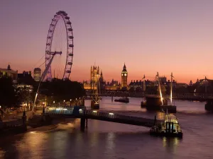 Prints of Late evening view from Waterloo Bridge along the River Thames towards the London Eye and the Palace of Westminster including Big Ben clock tower River Thames Prints: Late Evening London Eye Print