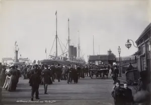 Prints of A large group of people converge towards the steam ship, SS Etruria, on the Landing Stage, Pierhead, Liverpool. Photograph by W and Company Limited. Date range: 1890-1910 Historic Images 1920s To 1940s Prints: Print of a crowded Landing Stage in Liverpool, circa 1890-1910