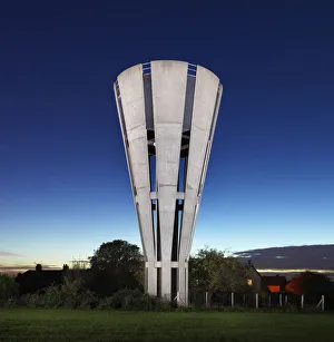 <b class=qtipBold><figcaption>Water Tower, Tonwell DP162838</figcaption></b><br>Water Tower, Temple Lane, Tonwell, Hertfordshire. General view of water tower, lit at twilight. 2013.<br><em>© Historic England Archive</em> Water Tower, Tonwell DP162838