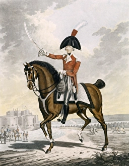 <b class=qtipBold><figcaption>William Pitt K021638</figcaption></b><br>WALMER CASTLE, Kent. Coloured engraving of the Right Honourable William Pitt the Younger (1759-1806) in military garb on horseback with Walmer Castle (or an equivalent fortification) in the background. Pitt retained the post of Lord Warden of the Cinque Ports between 1792 and his death in 1806. From 1708 Walmer Castle has been the official residence of the Warden.<br><em>© Historic England</em> William Pitt K021638