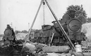 Images Dated 11th March 2014: 0-6-0 Dean Goods locomotives No s. 2479, 2576, 2425 and 2399 in the process of being scrapped