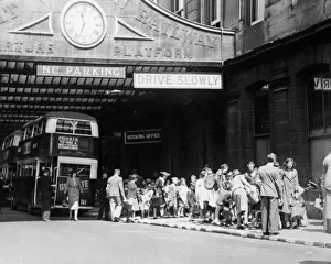 Departure Gallery: Evacuees waiting outside the departure platform at Paddington in 1939