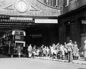 Paddington Gallery: Evacuees waiting outside the departure platform at Paddington in 1939