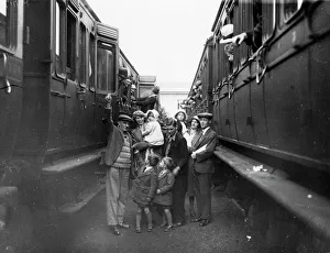 Family boarding a train in the carriage sidings at Swindon, for the annual Works trip Family boarding a train in the carriage sidings at Swindon, for the annual Works trip