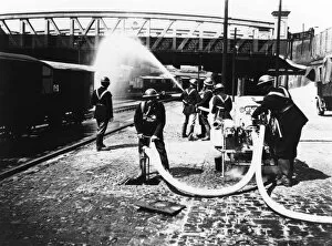Images Dated 28th February 2014: GWR fire brigade at Paddington Station taking part in a drill, c.1940