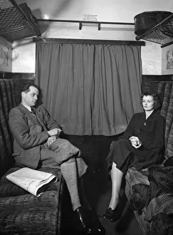 Publicity shot of couple in carriage, 1930s Publicity shot of couple in carriage, 1930s