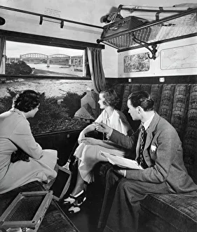 Publicity shot of passengers in carriage, 1930s Publicity shot of passengers in carriage, 1930s