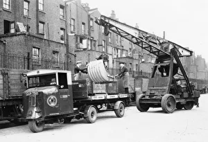 Scammel being loaded with Anderson Air Raid Shelter, West London, 1939 Scammel being loaded with Anderson Air Raid Shelter, West London, 1939