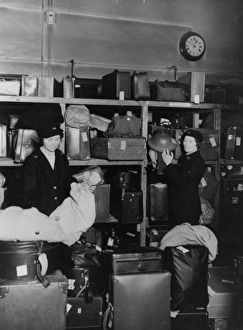 Women porters working in the left luggage office at Paddington station, during WWII Women porters working in the left luggage office at Paddington station, during WWII