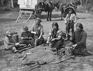 Romany children making clothes pegs Romany children making clothes pegs