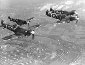 Print of Supermarine Spitfire Mk. IX in Flight over Biggin Hill