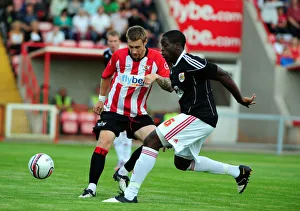 David Noble is tackled by Bristol Citys John Akinde David Noble is tackled by Bristol Citys John Akinde