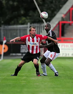 Marcus Stewart battles for the ball with Bristol Citys Kalifa Cisse Marcus Stewart battles for the ball with Bristol Citys Kalifa Cisse