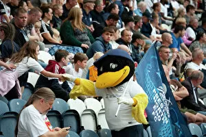 Mascot Collection: Deepdale Duck Shakes Hands With Young Fan