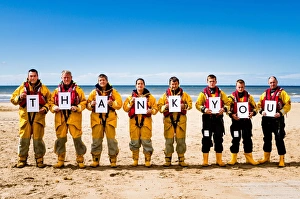 Crew members at Rhyl holding up letters spelling out the words Thank You Crew members at Rhyl holding up letters spelling out the words Thank You