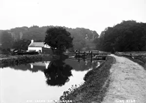 Prints of 3Rd Locks on the River Lagan - a view of the locks and lockhouse from the tow path. (Location: Northern Ireland: County Antrim: Belfast). Date: circa early 1900s River Prints: Early 20th Century Print of 3rd Locks on the River Lagan