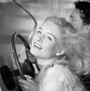 <b class=qtipBold><figcaption>Advertisement for beauty products</figcaption></b><br>Advertisement for beauty products -- male and female models (D Orme and M Colbrook) posing in a car. 1959<br><em>© The Colin Sherborne Collection/Mary Evans Picture Library</em> Advertisement for beauty products