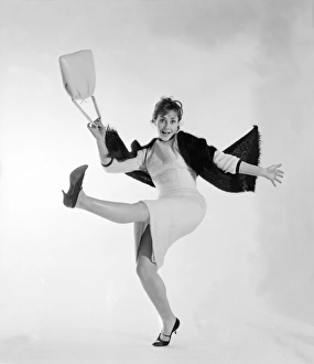 <b class=qtipBold><figcaption>Advertisement for Bournvita</figcaption></b><br>Advertisement for Bournvita -- teenage girl (G Hill) in an energetic pose. 1959<br><em>© The Colin Sherborne Collection/Mary Evans Picture Library</em> Advertisement for Bournvita