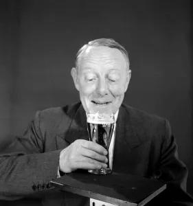 <b class=qtipBold><figcaption>Advertisement for M&B Export Beer</figcaption></b><br>Advertisement for M&B Export Beer -- male model (Derek Prentice) holding a full pint glass. 1959<br><em>© The Colin Sherborne Collection/Mary Evans Picture Library</em> Advertisement for M&B Export Beer