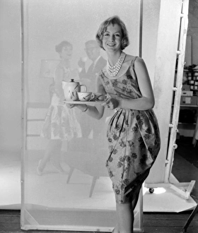 <b class=qtipBold><figcaption>Advertisement for Nescafe</figcaption></b><br>Advertisement for Nescafe -- female model with tray. 1959<br><em>© The Colin Sherborne Collection/Mary Evans Picture Library</em> Advertisement for Nescafe