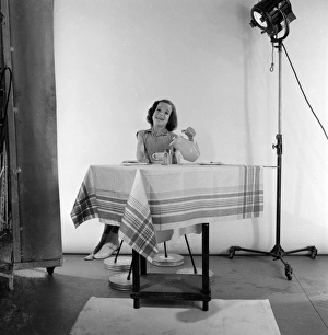 <b class=qtipBold><figcaption>Advertisement for Nescafe</figcaption></b><br>Advertisement for Nescafe -- little girl (Caroline Ellis) sitting at a table. 1959<br><em>© The Colin Sherborne Collection/Mary Evans Picture Library</em> Advertisement for Nescafe