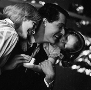 <b class=qtipBold><figcaption>Advertisement for Remington shavers</figcaption></b><br>Advertisement for Remington shavers -- three models posing as a happy family (J Fenton, Sarah Branch and Jane Hancock). 1959<br><em>© The Colin Sherborne Collection/Mary Evans Picture Library</em> Advertisement for Remington shavers