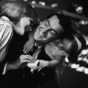 <b class=qtipBold><figcaption>Advertisement for Remington shavers</figcaption></b><br>Advertisement for Remington shavers -- three models posing as a happy family (J Fenton, Sarah Branch and Jane Hancock). 1959<br><em>© The Colin Sherborne Collection/Mary Evans Picture Library</em> Advertisement for Remington shavers