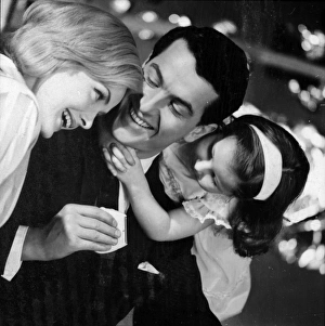<b class=qtipBold><figcaption>Advertisement for Remington shavers</figcaption></b><br>Advertisement for Remington shavers -- three models posing as a happy family (J Fenton, Sarah Branch and Jane Hancock). 1959<br><em>© The Colin Sherborne Collection/Mary Evans Picture Library</em> Advertisement for Remington shavers