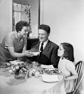 <b class=qtipBold><figcaption>Advertisement for Ross Foods</figcaption></b><br>Advertisement for Ross Foods -- family of three at the table (modelled by D Groves, Andrew Downie and M Baldock). 1959<br><em>© The Colin Sherborne Collection/Mary Evans Picture Library</em> Advertisement for Ross Foods